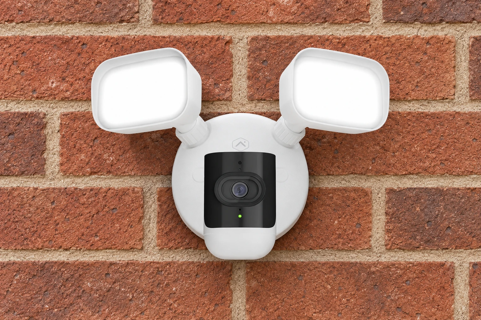 Illustration of the white floodlight camera mounted on clean red-brown British brickwork